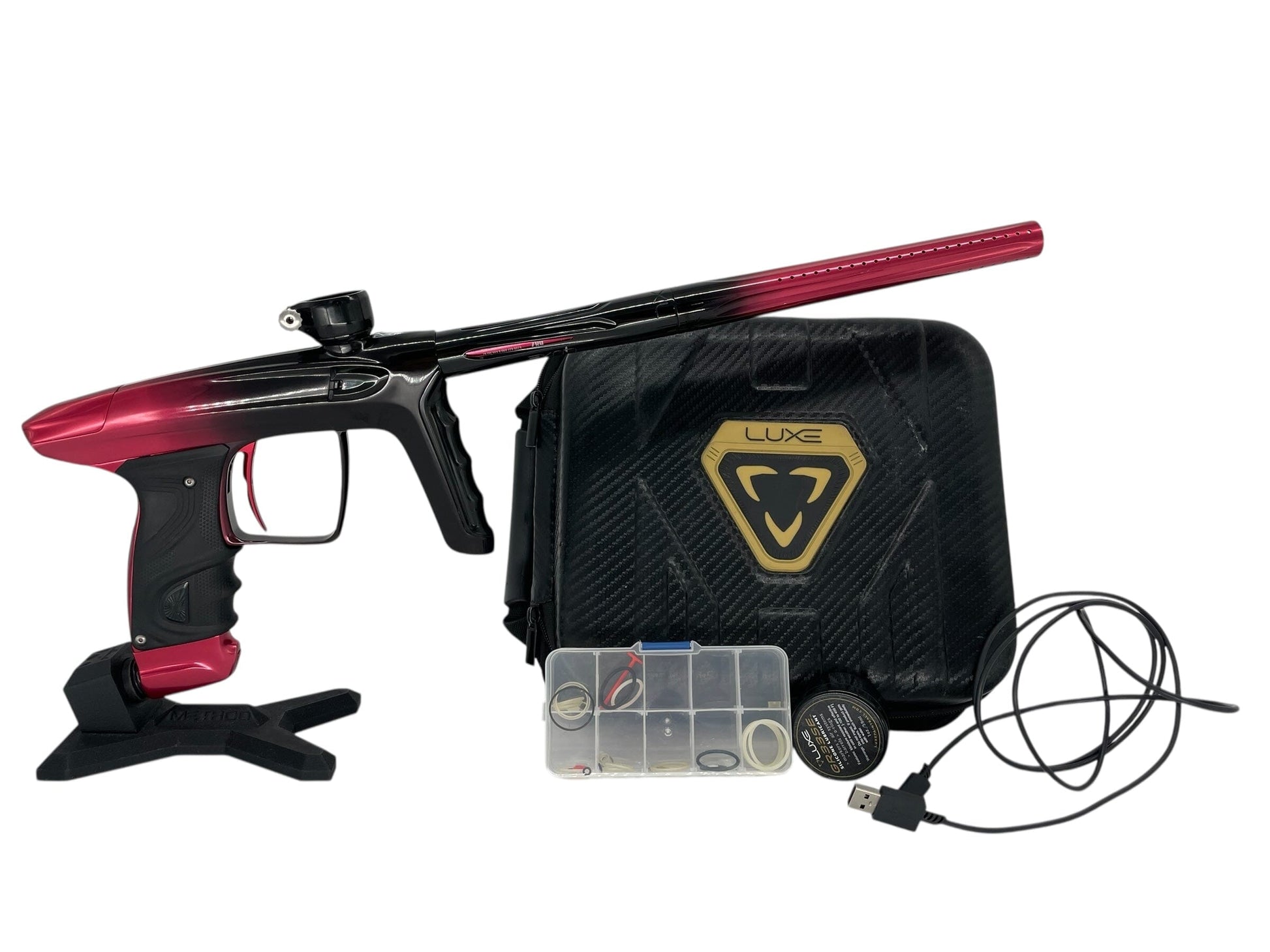 Used Dlx Luxe Tm40 Paintball Gun Red/Black Fade Paintball Gun from CPXBrosPaintball Buy/Sell/Trade Paintball Markers, New Paintball Guns, Paintball Hoppers, Paintball Masks, and Hormesis Headbands