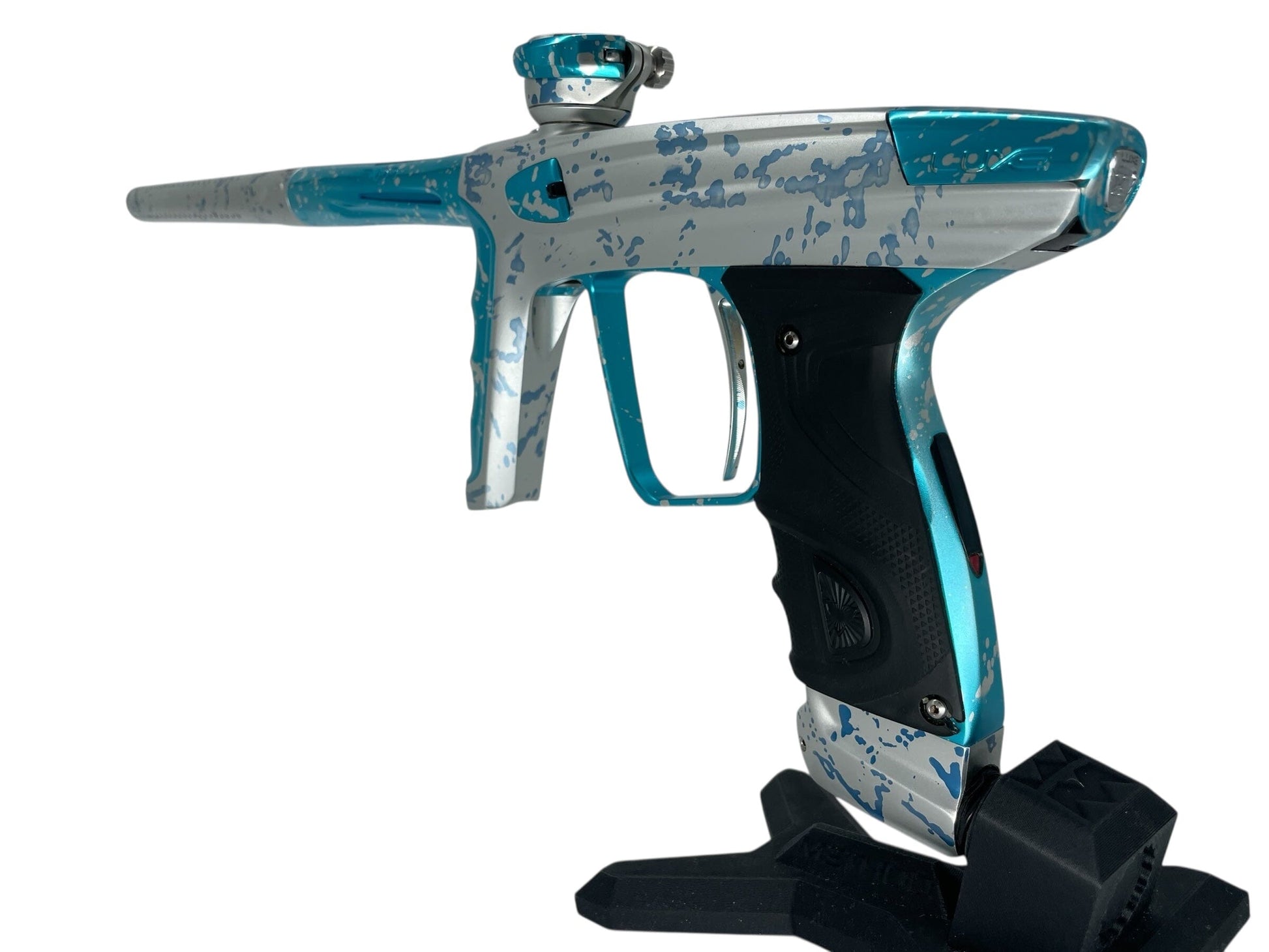 Used Dlx Luxe X Paintball Gun Silver Teal Splash Paintball Gun from CPXBrosPaintball Buy/Sell/Trade Paintball Markers, New Paintball Guns, Paintball Hoppers, Paintball Masks, and Hormesis Headbands