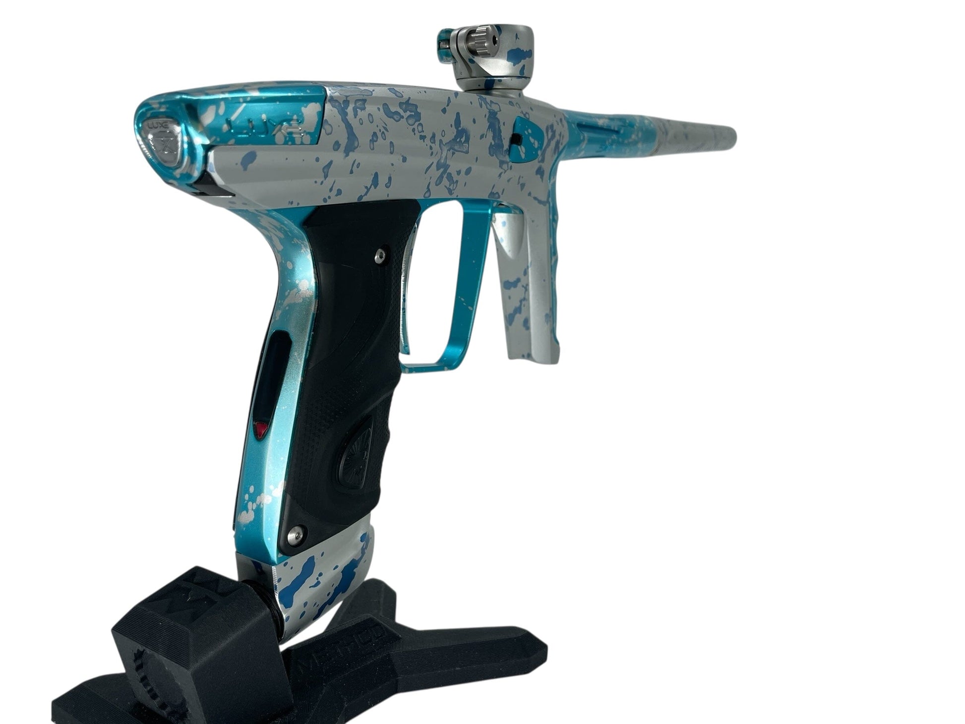 Used Dlx Luxe X Paintball Gun Silver Teal Splash Paintball Gun from CPXBrosPaintball Buy/Sell/Trade Paintball Markers, New Paintball Guns, Paintball Hoppers, Paintball Masks, and Hormesis Headbands