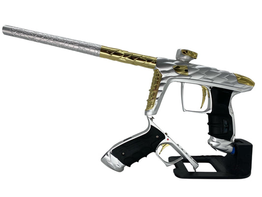 Used Dlx Adrenaline Luxe Idol Paintball Gun Silver/Gold With Mech Paintball Gun from CPXBrosPaintball Buy/Sell/Trade Paintball Markers, New Paintball Guns, Paintball Hoppers, Paintball Masks, and Hormesis Headbands