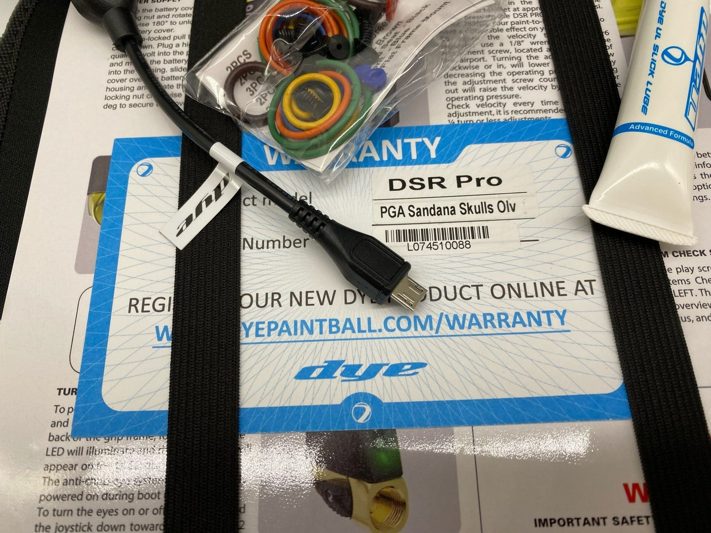 Used Dye DSR Pro Paintball Gun - PGA SANDANA SKULLS Olive Paintball Gun from CPXBrosPaintball Buy/Sell/Trade Paintball Markers, New Paintball Guns, Paintball Hoppers, Paintball Masks, and Hormesis Headbands