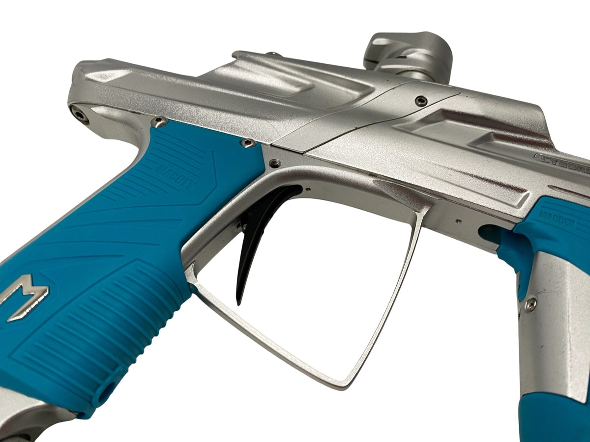 Used Macdev Cyborg 6 Paintball Gun Silver Paintball Gun from CPXBrosPaintball Buy/Sell/Trade Paintball Markers, New Paintball Guns, Paintball Hoppers, Paintball Masks, and Hormesis Headbands