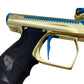 Used Method SP Shocker Era Gold/Teal Paintball Gun with Stainless Steel Inserts Paintball Gun from CPXBrosPaintball Buy/Sell/Trade Paintball Markers, New Paintball Guns, Paintball Hoppers, Paintball Masks, and Hormesis Headbands