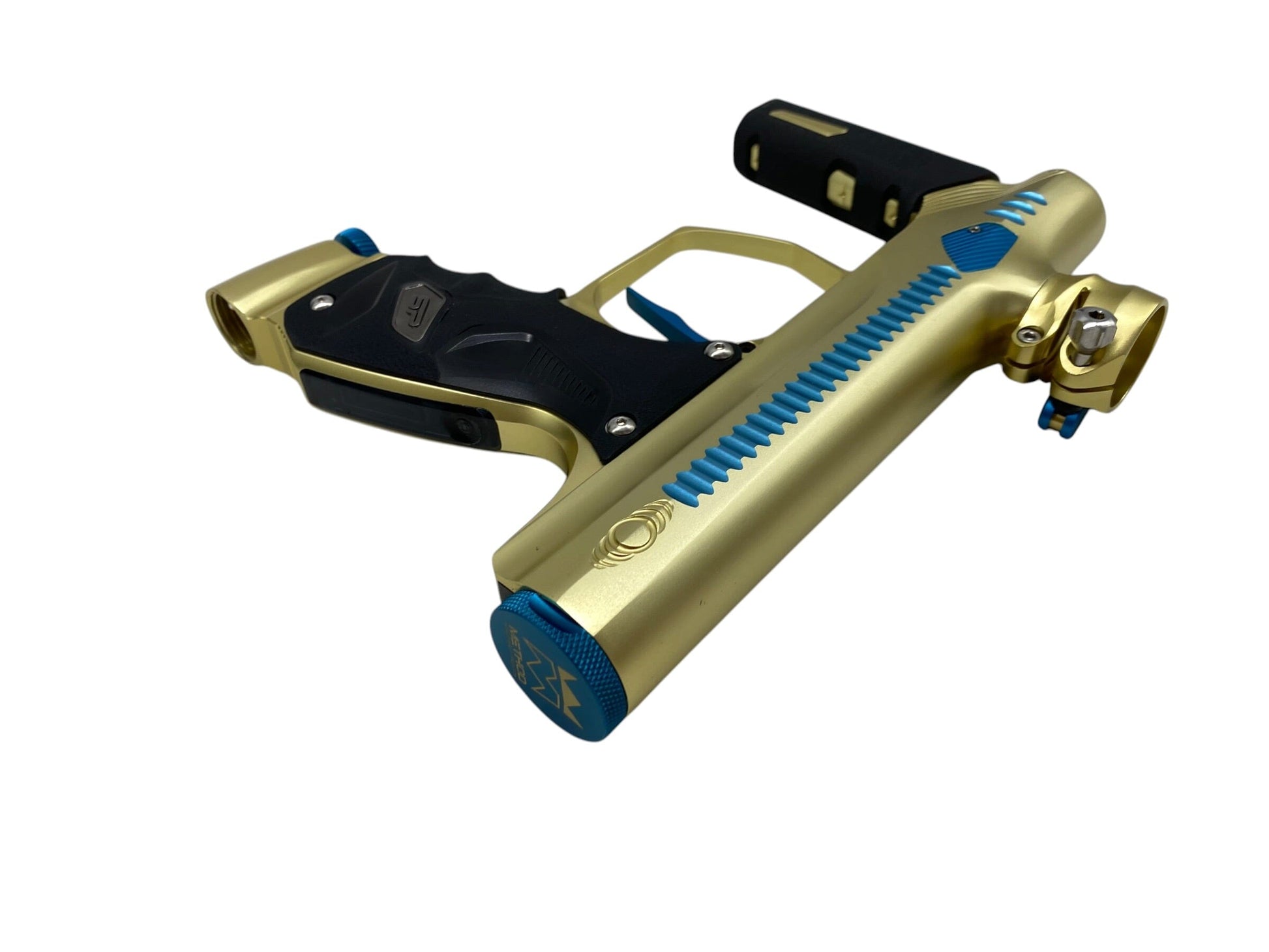 Used Method SP Shocker Era Gold/Teal Paintball Gun with Stainless Steel Inserts Paintball Gun from CPXBrosPaintball Buy/Sell/Trade Paintball Markers, New Paintball Guns, Paintball Hoppers, Paintball Masks, and Hormesis Headbands